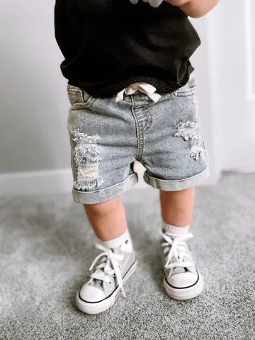 DISTRESSED DENIM SHORTS