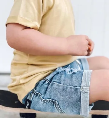 DISTRESSED DENIM SHORTS