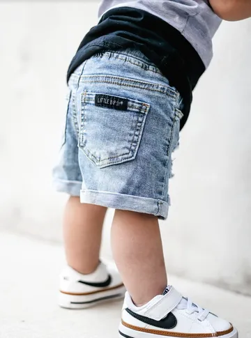 DISTRESSED DENIM SHORTS